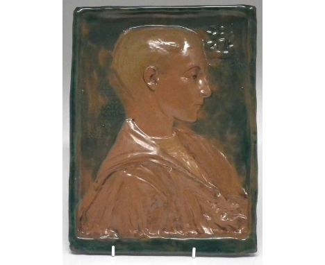 Della Robbia Conrad Dressler plaque  the moulded portrait looking towards a tall ship on the wall, painted mark to reverse, 3