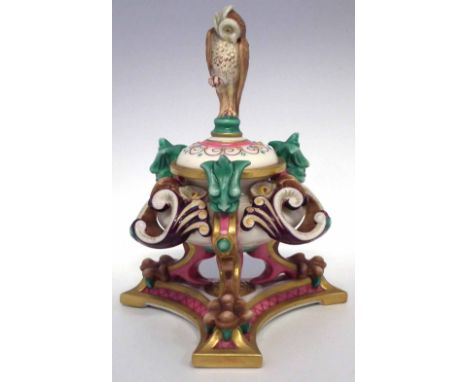Royal Worcester inkwell  with elaborately modelled body, owl finial, and triform base, printed mark to base, late 19th centur