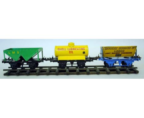 Hornby Series O gauge, three various freight wagons: Shell Lubricating Oil tanker; Robert Hudson side tipping wagon; and LMS 