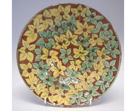 Della Robbia dish   incised by Harry Fletcher and painted by Annie Jones with closely packed flora, incised and painted marks