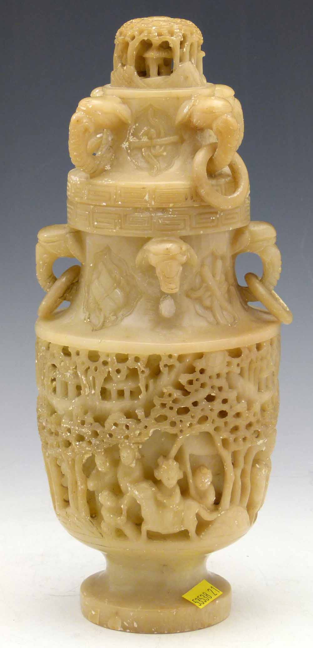 Chinese alabaster vase and cover carved in relief with figures amongst