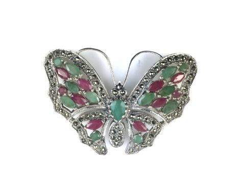 A novelty jewelled ruby and emerald butterfly brooch in Sterling Silver. Diameter 5cm / 2".