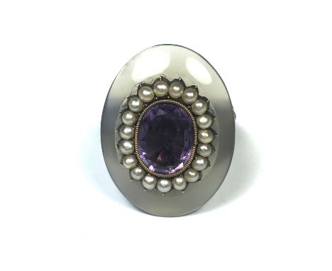 An antique 19th Century amethyst, pearl and chalcedony ring in high carat yellow gold, set with an oval cut amethyst surround