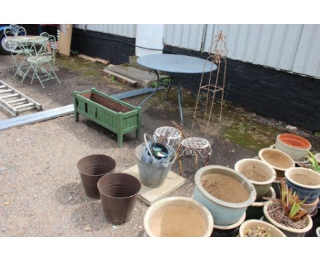 A garden obelisk; together with galvanised pails; wire work planter holders etc. 