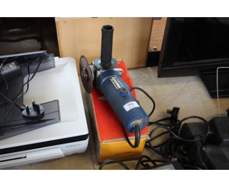 An Agoiama angle grinder with box