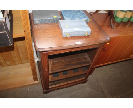 An Ercol glass fronted hifi cabinet