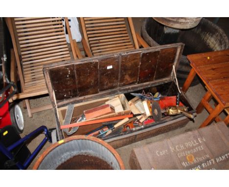 A metal trunk and contents of various tools - some sold as collector's items 