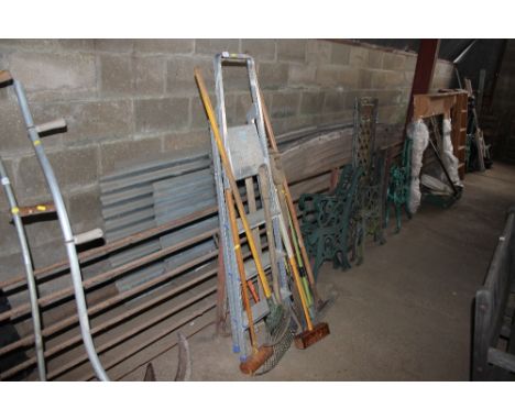 A quantity of gardening tools and an aluminium step ladder