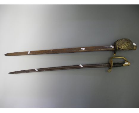 A 19th Century French sword with brass ornate hilt with black handle grip, together with another 19th Century sword with open