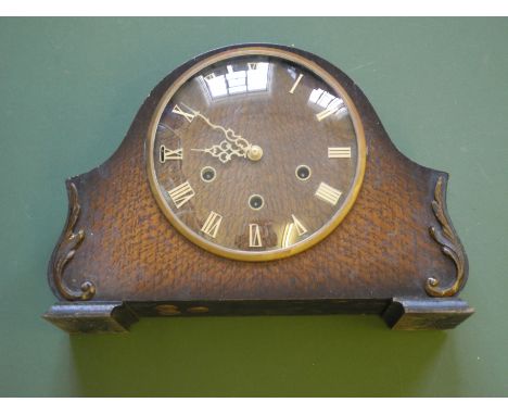 Oak cased mantle clock.
