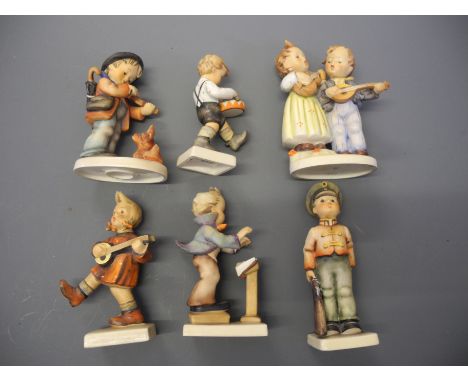 Six Hummel figures.