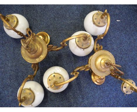 Pair of three bulb ceiling light fittings.