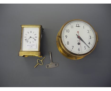 A Smith's Astral brass bodied clock together with an unnamed brass bodied carriage clock with subsidiary dial, both having ke
