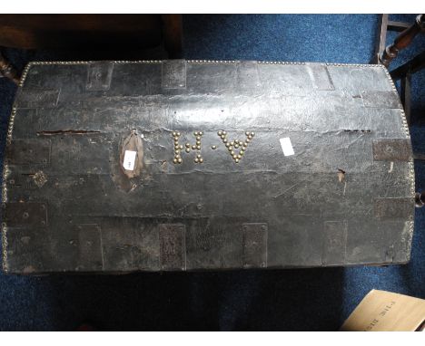 Leather covered wooden trunk.