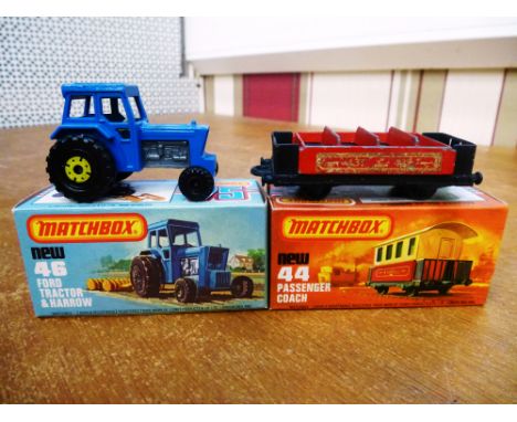 2 BOXED MATCHBOX VEHICLES - NO. 46 FORD TRACTOR (NO HARROW) AND NO. 44 PASSENGER COACH (NO ROOF)