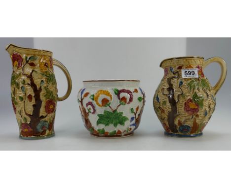 Woods embossed Indian tree design jugs together with later Tony Woods similar item (3)