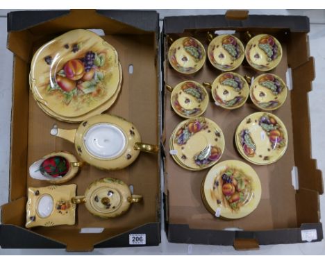 A large collection of Orchard gold dinnerware items to include dinner plates, sandwich plates, lidded sugar bowl, cream, cups