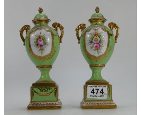 A pair of Noritake cabinet vases height 21cm (tiny nip to edge of lid) (2)