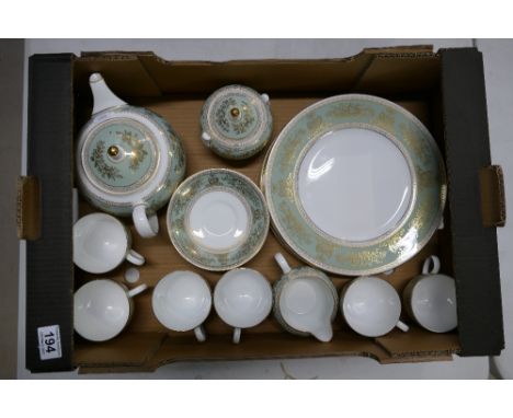 A collection of Wedgwood Columbia patterned dinnerware to include dinner plates, teapot, cups, saucers, cream and sugar bowls
