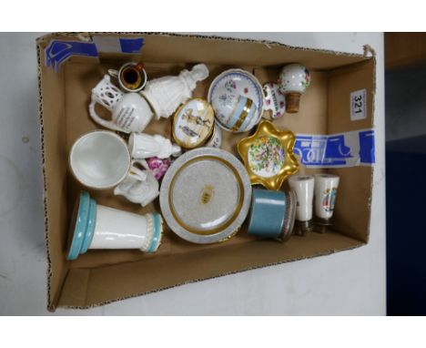 A mixed collection of items to include Royal Copenhagen vase, Staffordshire enameled boxes, unmarked decorative ceramic figur