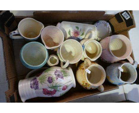 A collection of hand painted Radford and E. Radford items to include vases, jugs, plates etc (15)