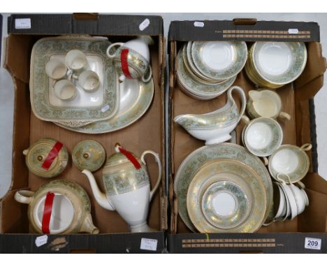 A collection of Wedgwood dinnerware in the columbia pattern to include teapot, coffee pot, cups, saucers, dinner plates, past