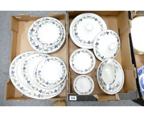 A large collection of Royal Doulton Burgundy dinnerware to include serving platters, dinner plates, tureens, side plates, gra