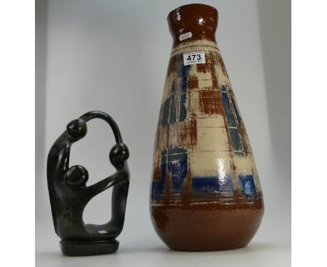 Large Abstract glazed terracotta vase together with similar stone figure children playing.