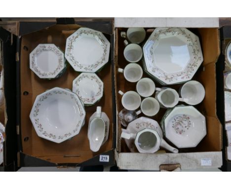 A collection of Johnson Brothers ironstone dinnerware to include plates, saucers, side plates, cups, etc (2 trays)