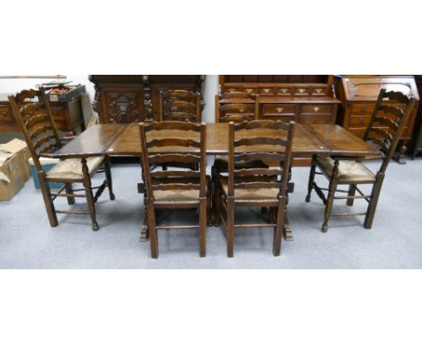 20th Century Oak draw leaf table together with 6 matching ladder back chairs(7)