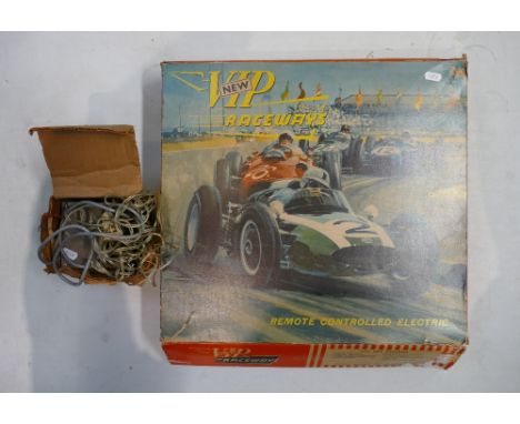 VIP raceways remote controlled electric scalextric style toy cars (boxed) together with original power supple (untested)