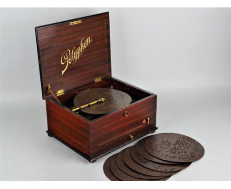 Polyphon Nr. 41, um 1910Im Holzgehäuse, mahagonifarben, eingebautes Zungenspielwerk mit Blechplatten, Ø 20,6cm, zu betreiben,