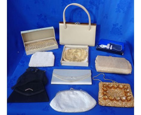 A 1950s CZARINA HANDBAG with a collection of evening bags, some boxed