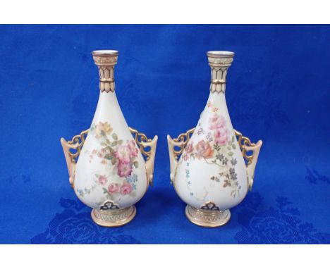 A PAIR OF ROYAL WORCESTER BLUSH IVORY VASES 16.5cm high 