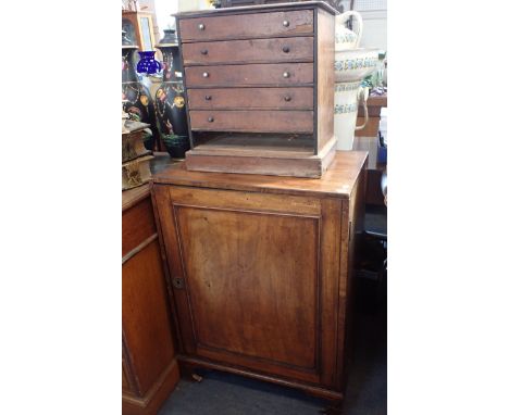 A 19TH CENTURY MAHOGANY CUPBOARD, OF SMALL PROPORTIONS with sliding shelves, on bracket feet 58cm wide and a mahogany butterf