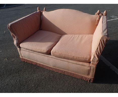 A TWO-SEATER KNOLE SOFA on turned bun feet,155cm wide (for re-upholstery)