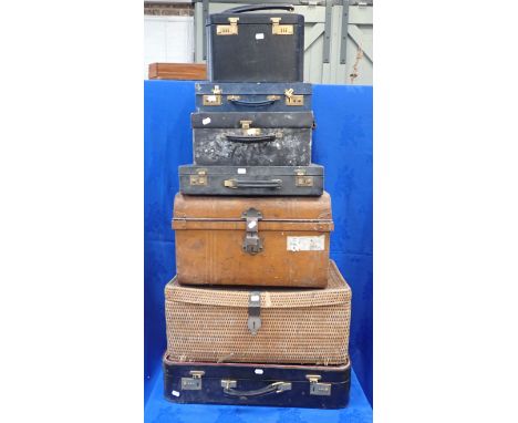 A WICKER PICNIC HAMPER (UNFITTED), A TIN TRUCK and a collection of leather cases