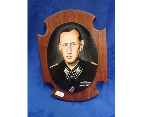A NAIVE PORTRAIT PAINTING OF REINHARD HEYDRICH mounted on a hardwood plaque