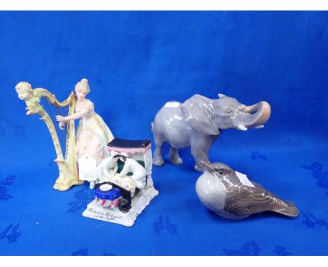 A ROYAL COPENHAGEN ELEPHANT AND A BIRD with ceramic fairing and continental porcelain figure 