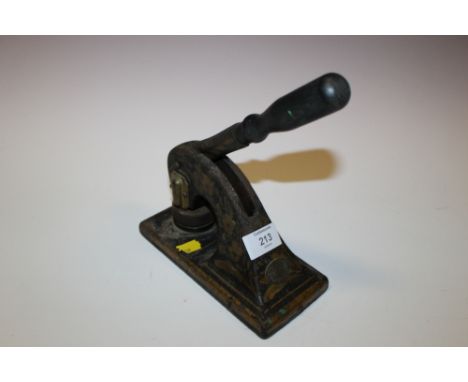 A CAST METAL CINEMA TICKET STAMP FOR THE ALHAMBRA PICTURE HOUSE, LONGTON, MADE BY JORDAN & SONS LTD. OF CHANCERY LANE, LONDON