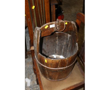 A WOODEN GARDEN PLANTER