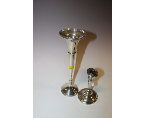 A HALLMARKED SILVER TRUMPET SPECIMEN VASE TOGETHER WITH A SILVER CANDLESTICK  A/F