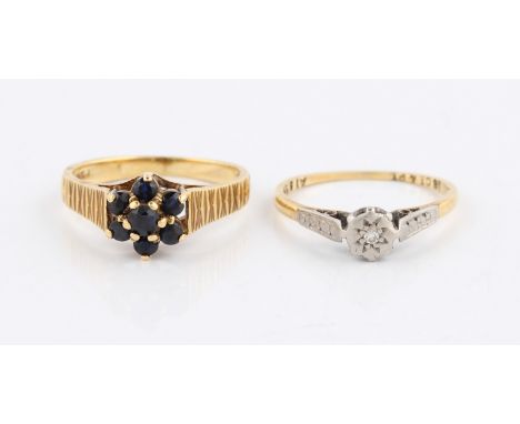 An 18ct yellow gold sapphire flower head design ring, hallmarked London 1974, ring size K½, together with a diamond ring with