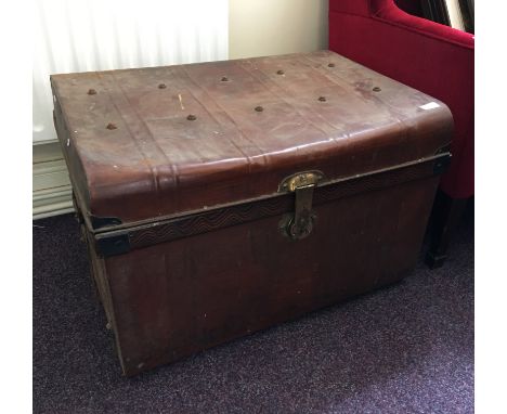 A metal travel trunk.