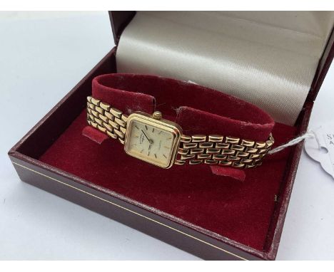 Rotary; A 9ct Gold Cased Ladies Quartz Wristwatch, the rectangular signed dial with lined markers, to intergral 9ct gold bric