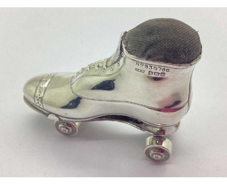 An Edwardian Novelty Pin Cushion in The Form of A Roller Boot, Crisford &amp; Norris, Birmingham 1909, registered design 5357