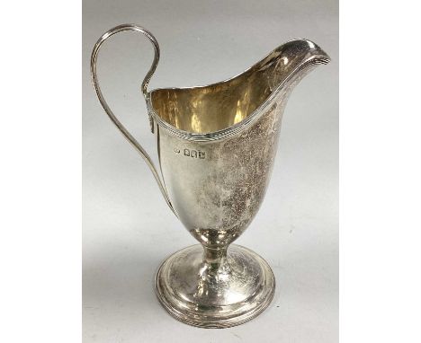 A Britannia Standard Hallmarked Silver Helmet Shape Jug, (makers mark rubbed) London 1914, of plain form, with reeded edge an