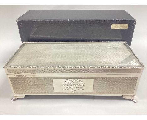 A Large Hallmarked Silver Cigarette Box, H.Bros, Birmingham 1976, of rectangular form allover engine turned, inscribed to the