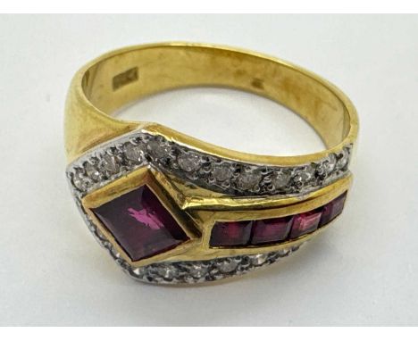 A Middle Eastern Style Diamond and Ruby Dress Ring, of abstract design, collet and millegrain set, stamped "18k" (finger size