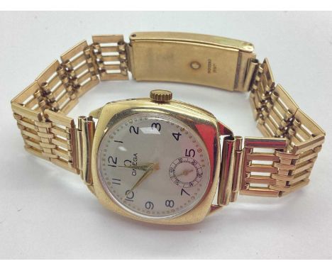 Omega; A Vintage 9ct Gold Cased Gent's Wristwatch, the signed champagne dial with gilt roundlet border, black Arabic numerals